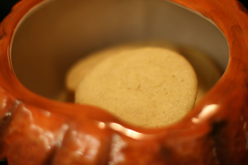 Soft Vanilla Sugar Cookies are show inside an orange cookie jar.