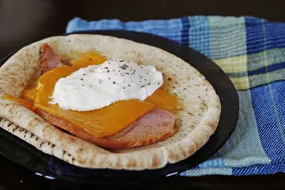 Ham, Cheddar and Poached Egg Pita Breakfast Sandwich