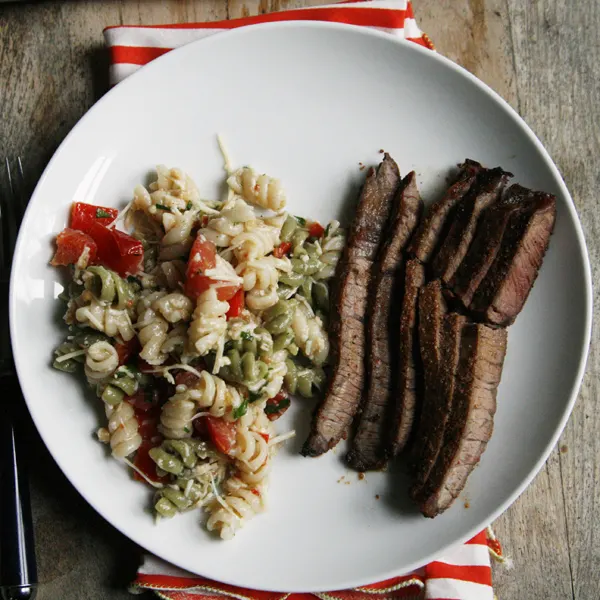 Chili Garlic Steak with Cheesy Veggie Caesar Pasta Salad