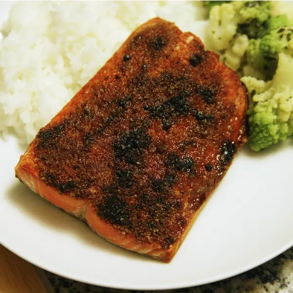 An overhead shot of Broiled Sockeye Salmon. It has some caramelized spots.