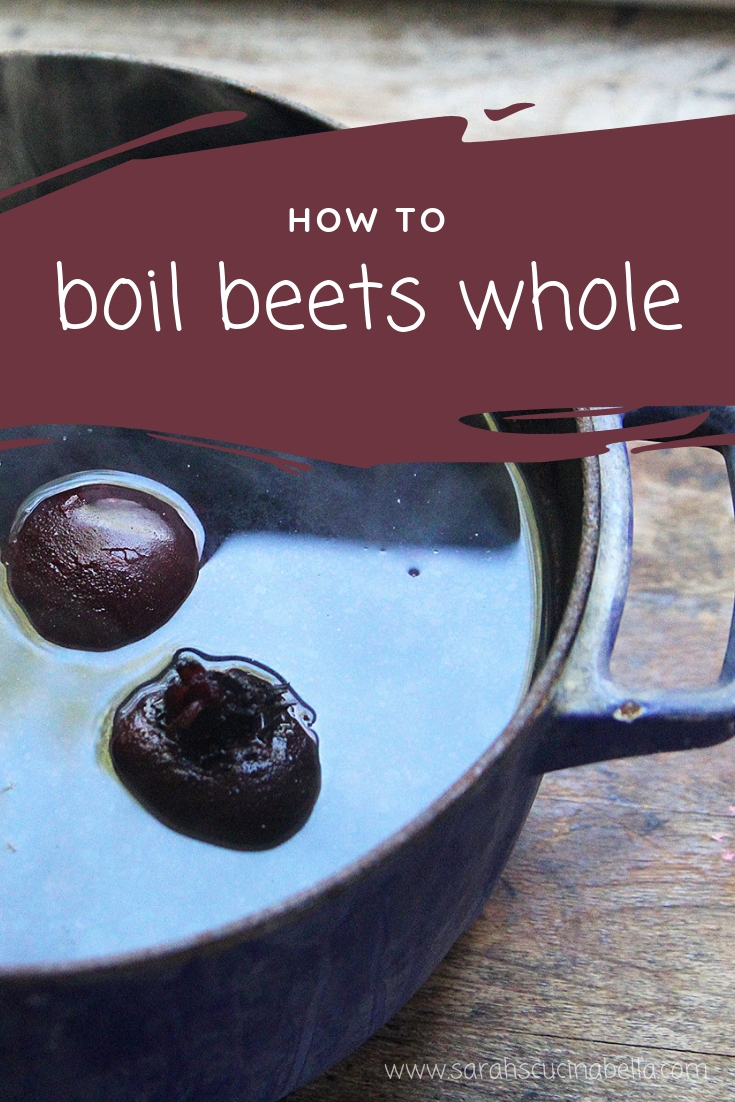 An image of beets submerged in water in a pot is shown with the words "How to Boil Beets Whole" superimposed on top.