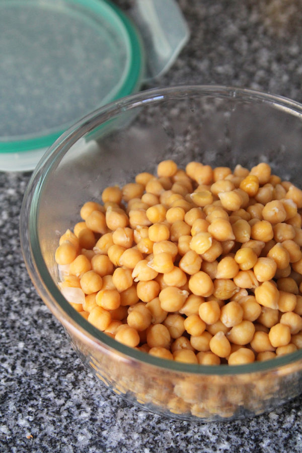 Cooked from dried, this shows a bowl of prepared chickpeas. This post is about how to cook dried chickpeas.