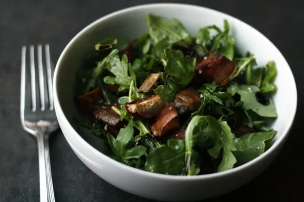 A simple arugula salad, perfect for celebrating the season's freshest flavors.