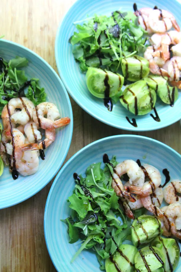 Three plates of Roasted Shrimp and Green Tomato Salad
