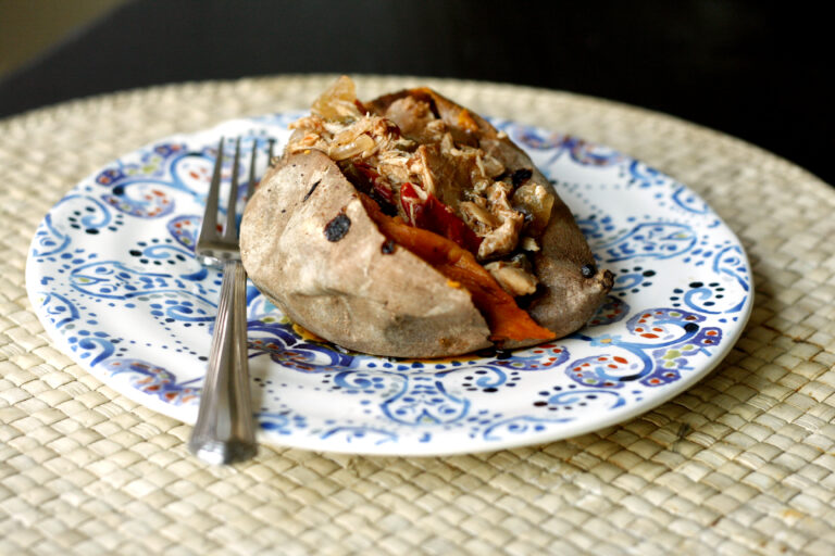 Slow Cooker Pulled Barbecue Chicken Thighs on Sweet Potatoes