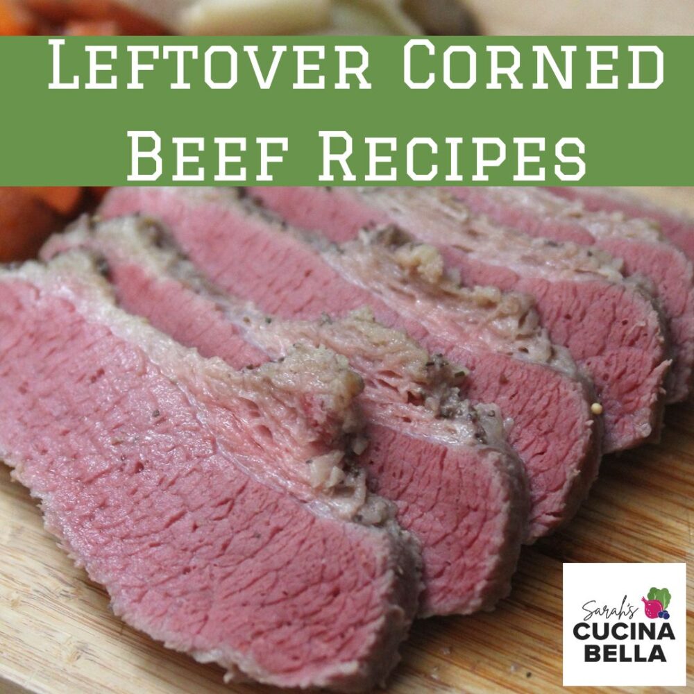A picture of slices of cooked corned beef on a wooden cutting board is shown. It is reddish with brown and tan fat at the edges. The image has the words "leftover corned beef recipes" and "sarah's cucina bella."